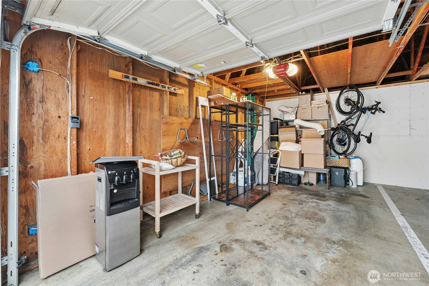 1 car individual garage-the garage is in a shared building with another space.