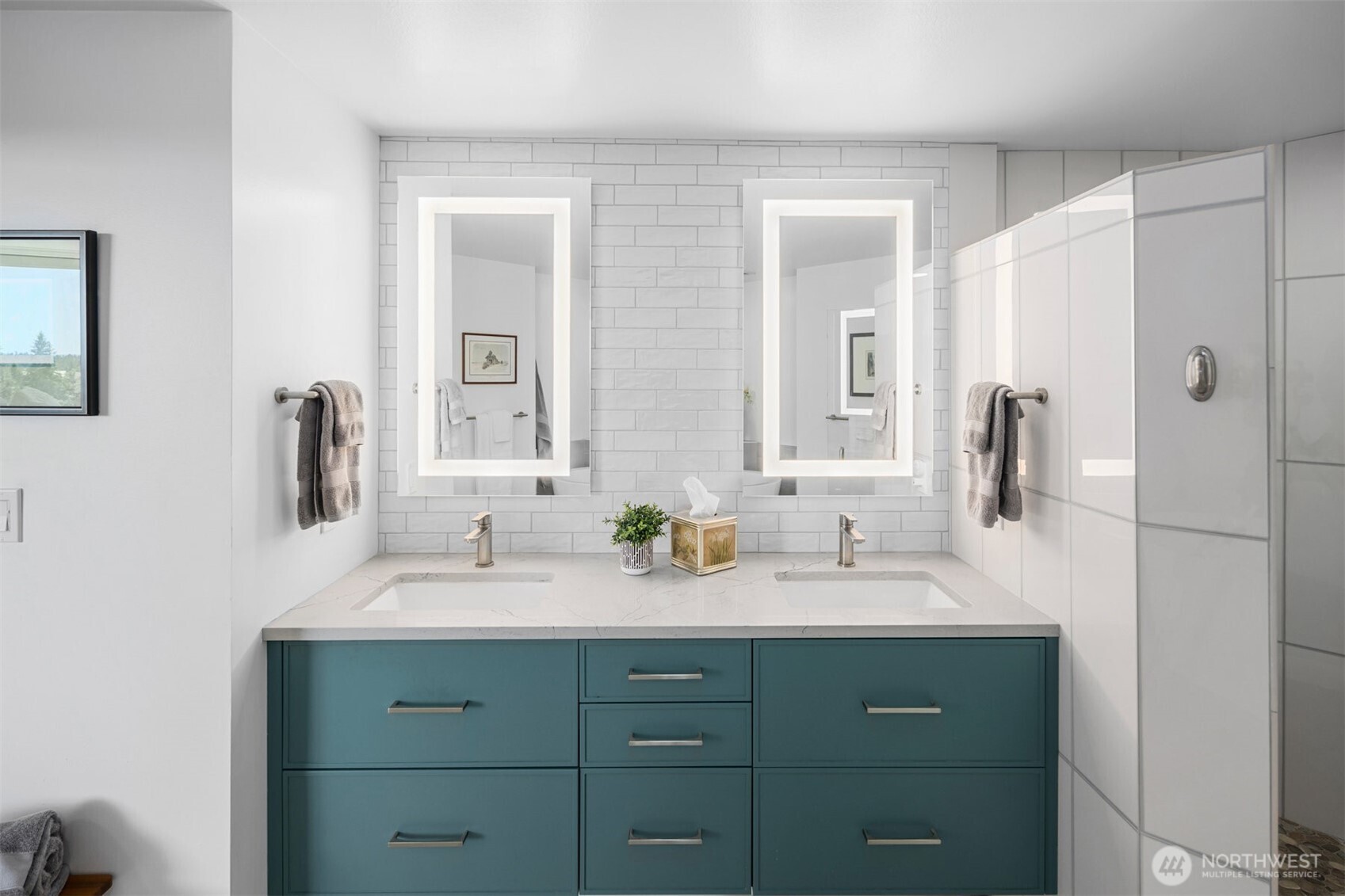 Primary bedroom retreat in this remodeled downtown Bellevue condo.