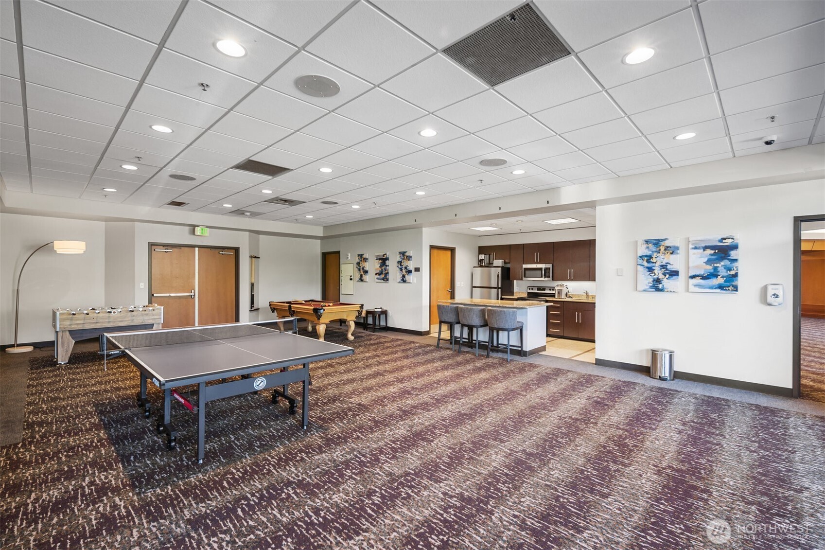 Downtown Bellevue skyline views from large windows in this luxury condominium.