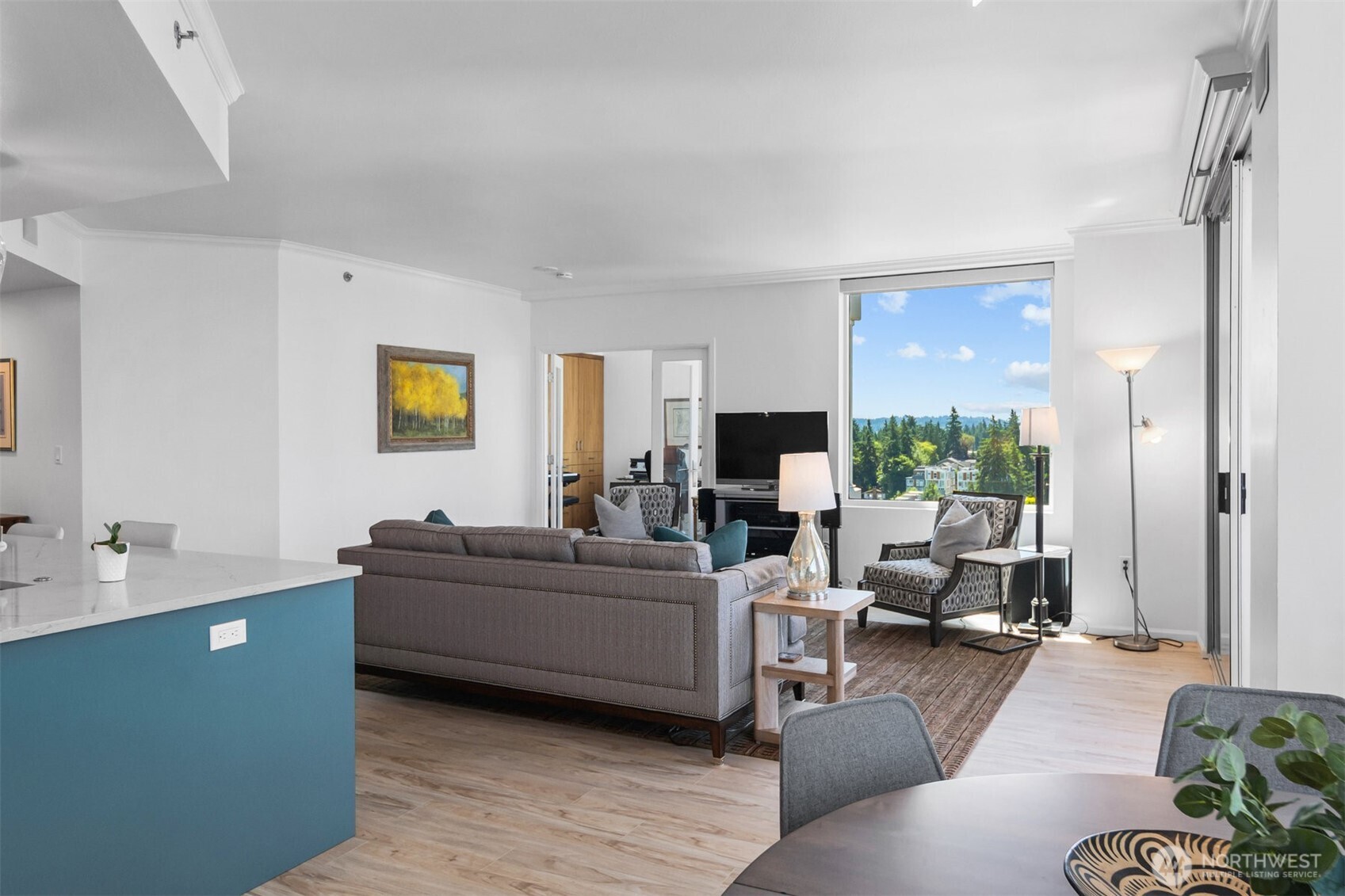 Spacious living area ideal for entertaining with seamless flow to dining and kitchen.