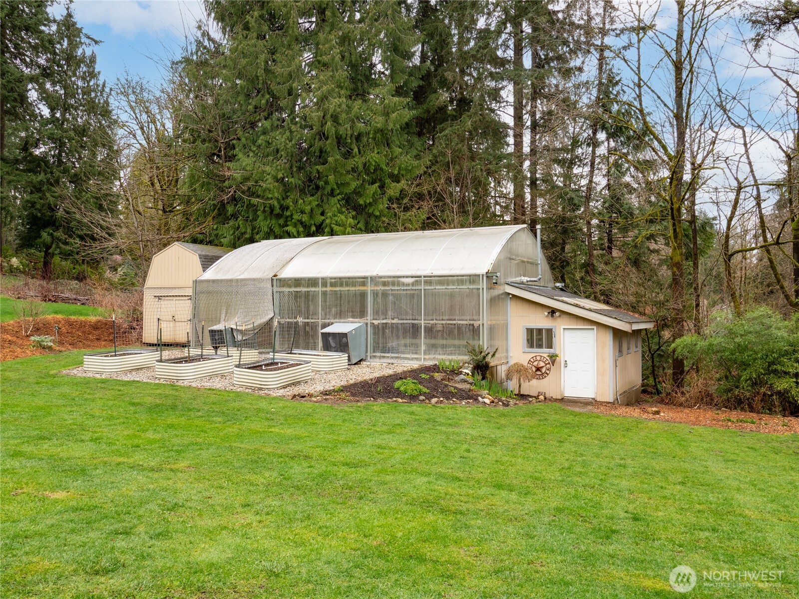 Home with adjacent fire pit area - fun to gather and relax.