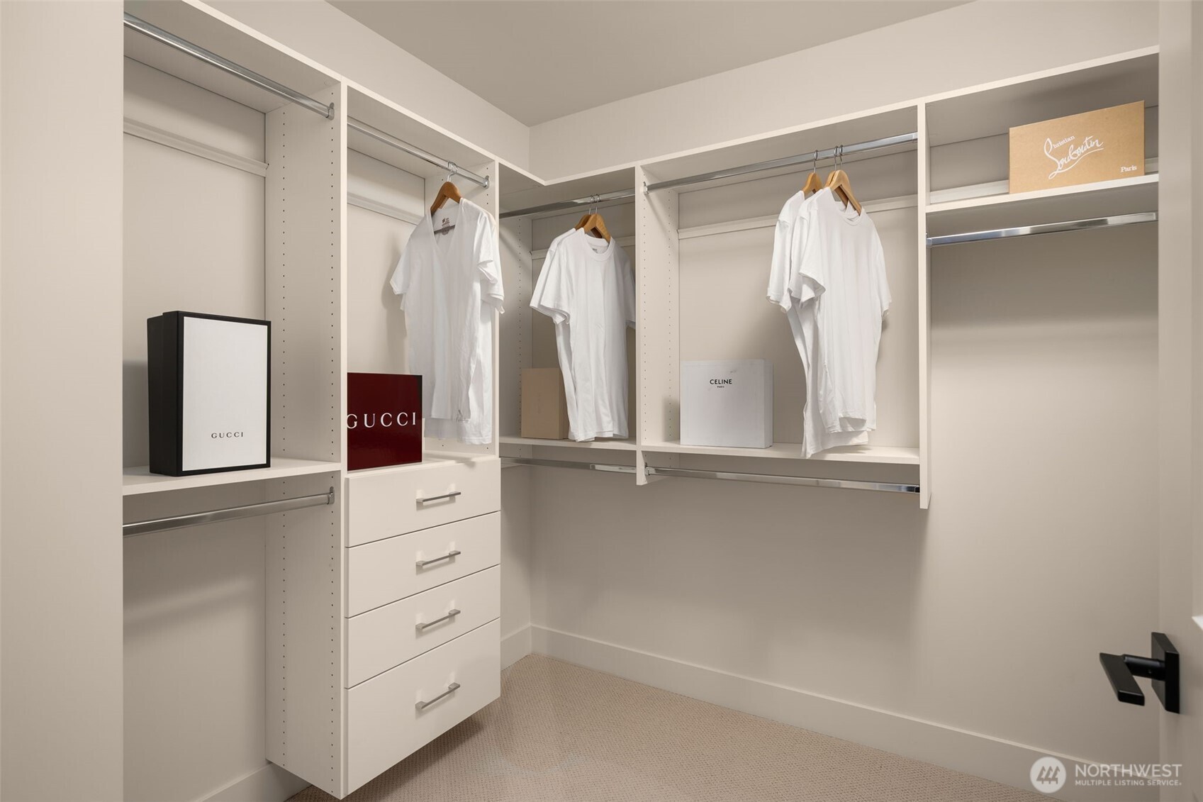 Primary walk-in closet with built-ins.