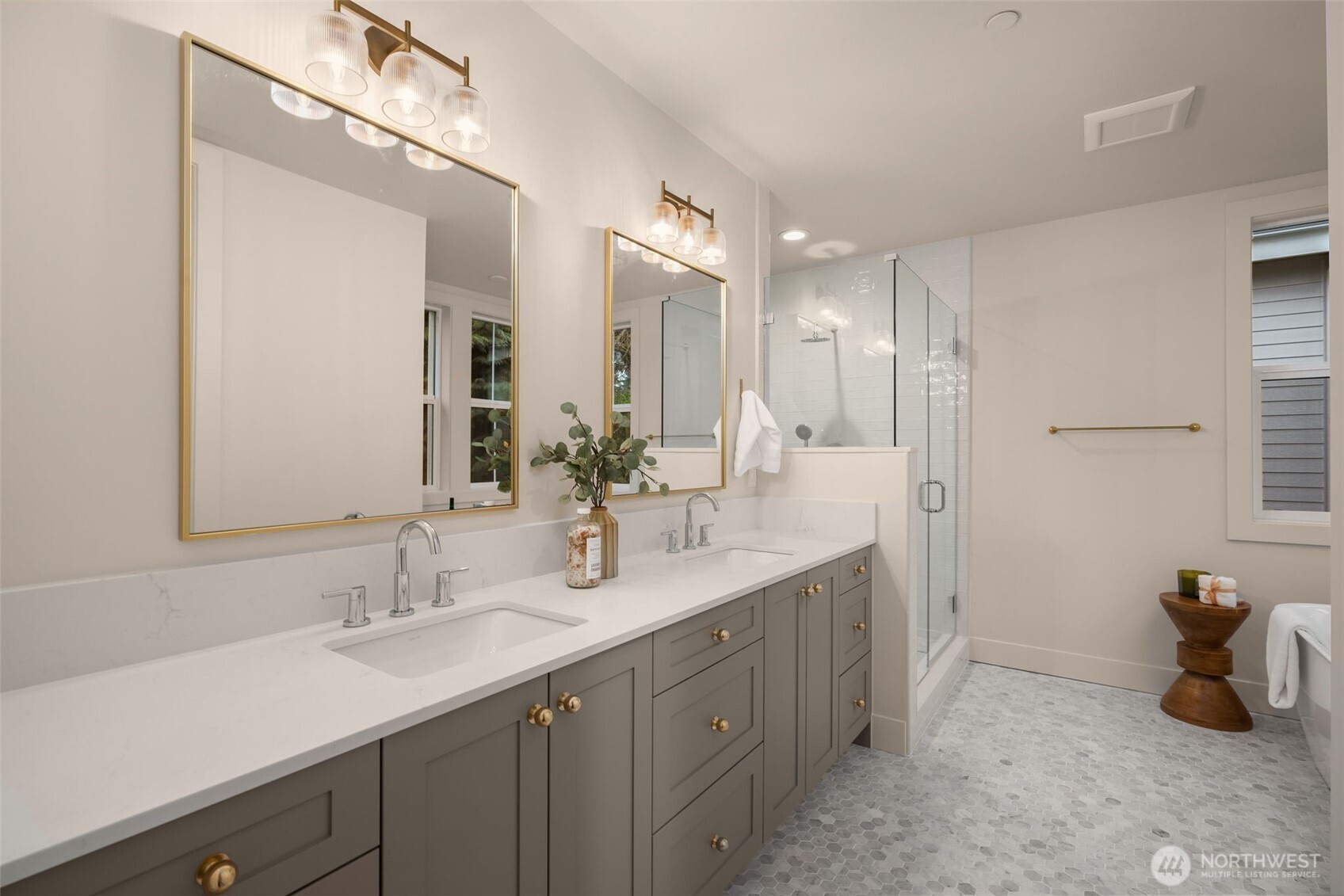 Heated floors + dual sinks.