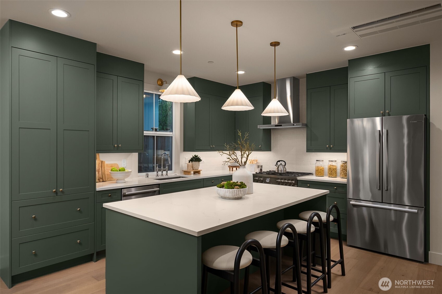 Kitchen featuring a premium stainless steel appliance package. featuring Bertazzoni Italia, Bosch, and Samsung