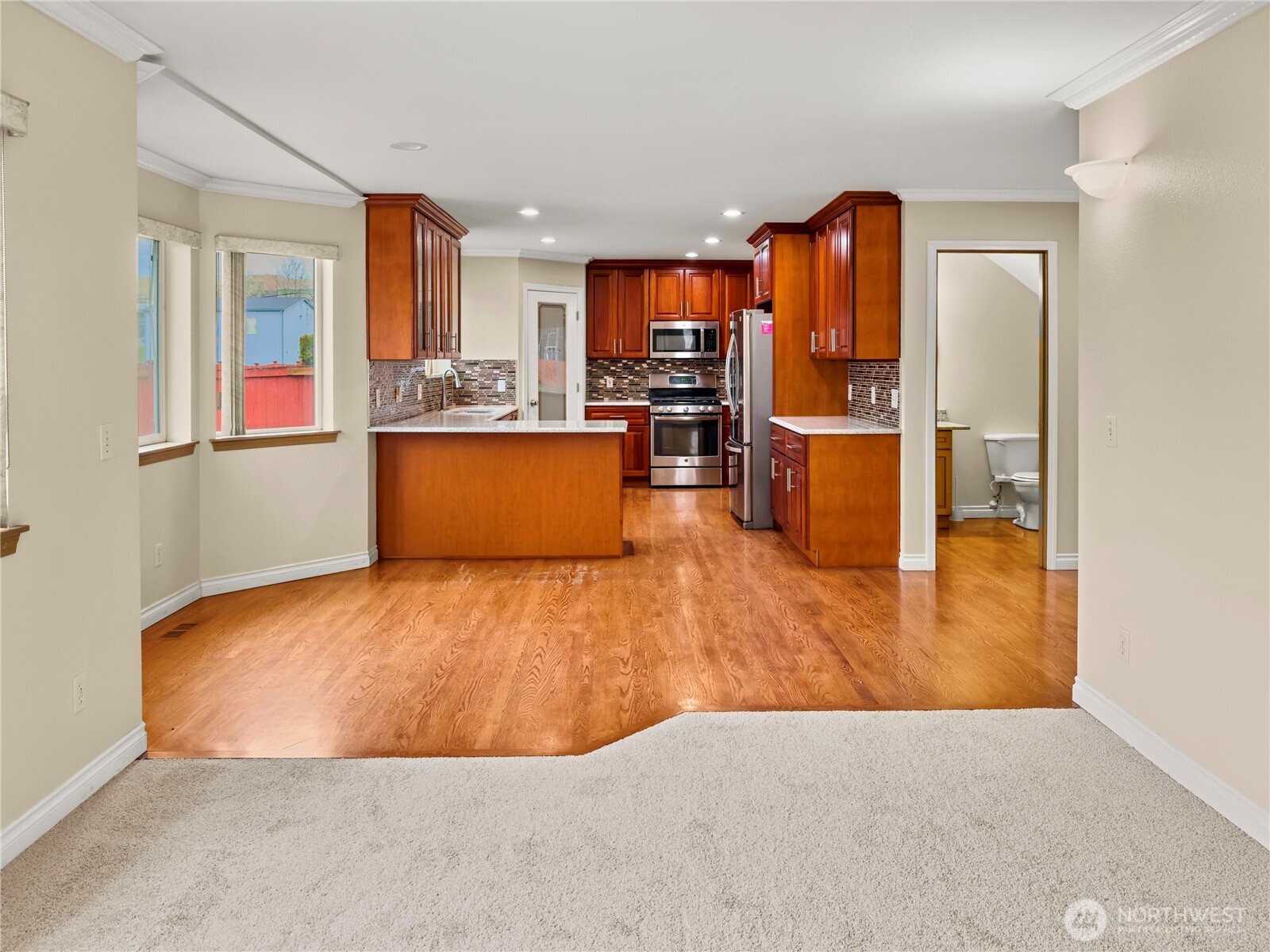 The family room is a natural extension of the kitchen and casual dining area.