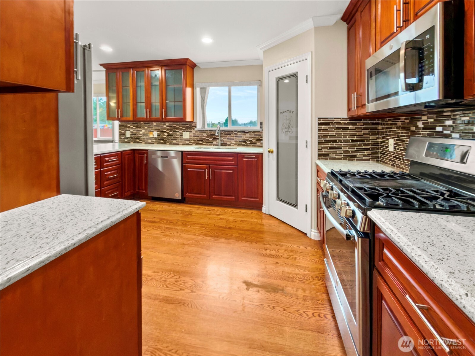 Custom cabinetry provides style and storage.