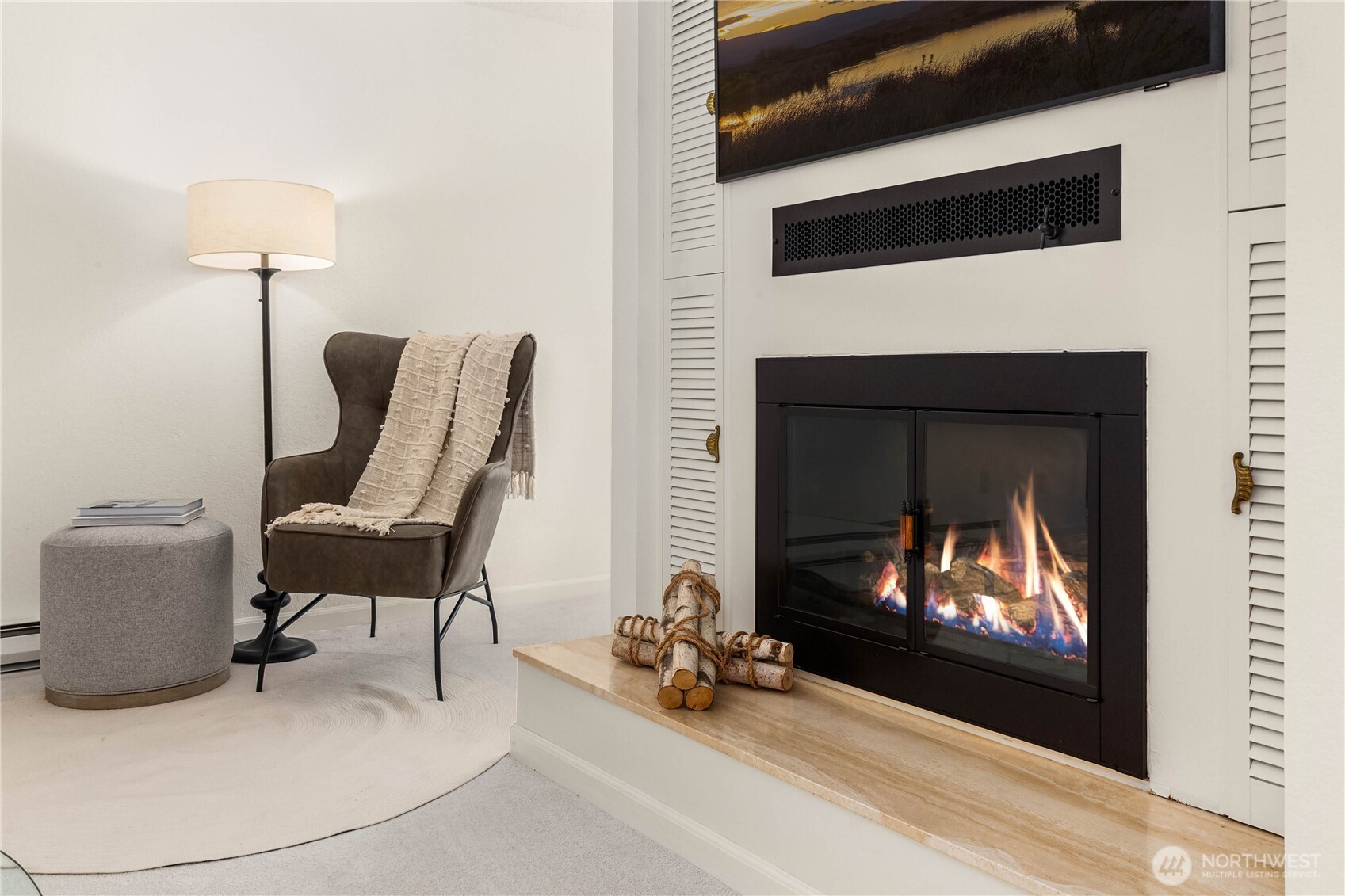 Cozy wood fireplace in the main living area.