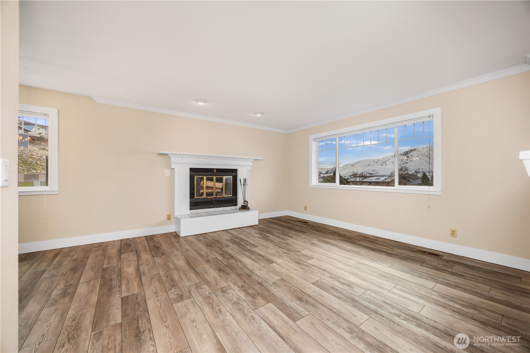 Real wood burning fireplace in upper living.
