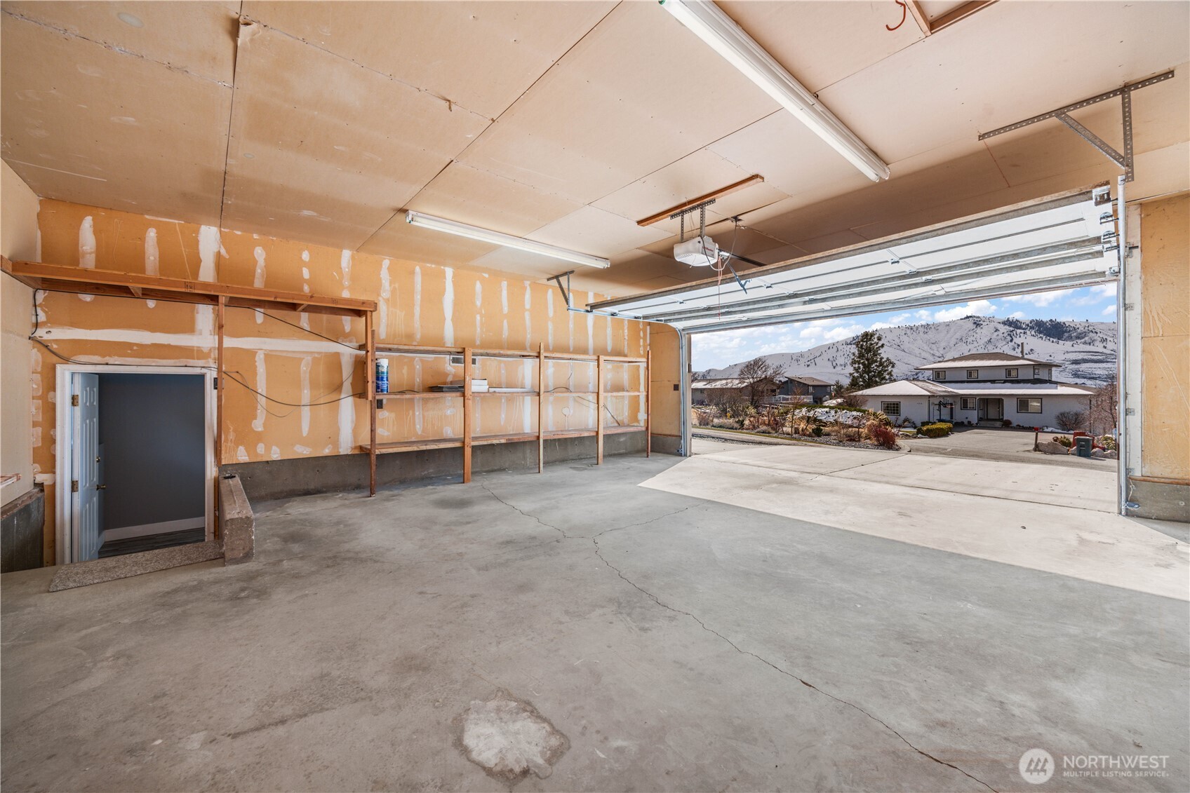 Oversized 2 car garage with ample storage.