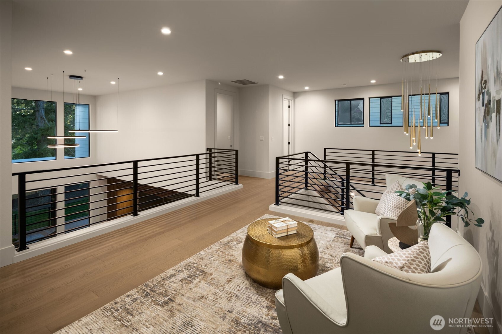 Custom metal railings throughout and plenty of open space