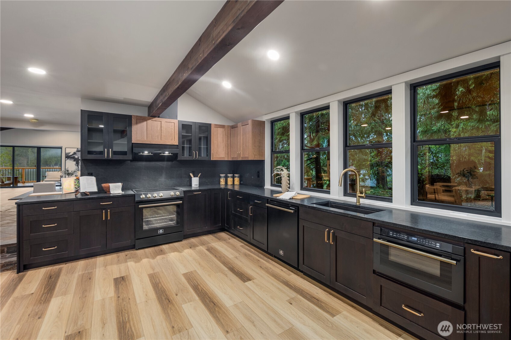 Amazing black on black kitchen with Forno appliances