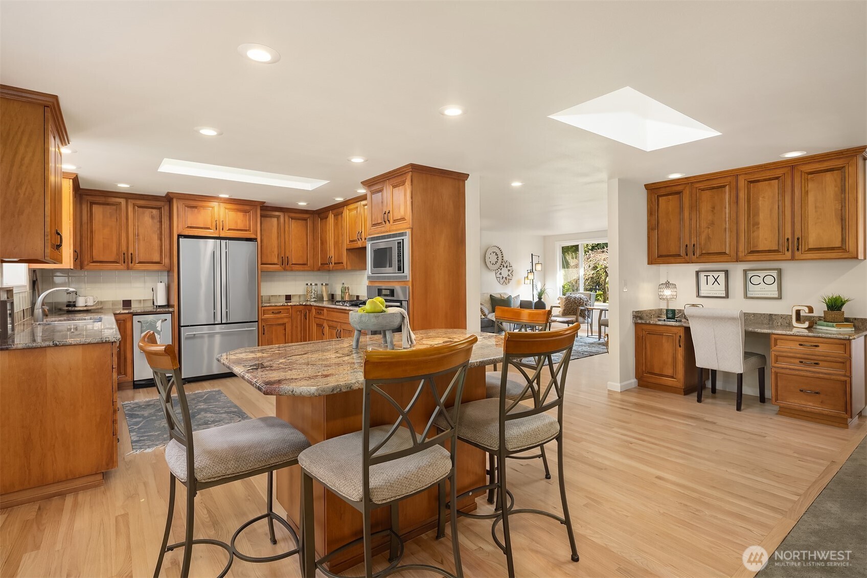 Granite and stainless kitchen with eating space and Island