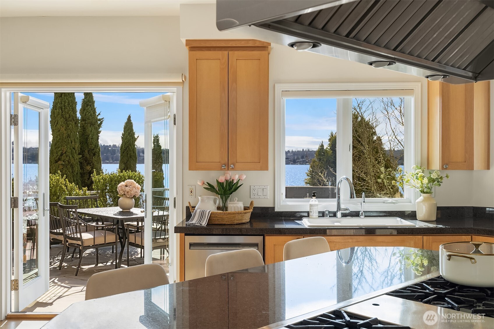 An effortlessly flowing floor plan designed for a modern, connected lifestyle where every room transitions toward the water.