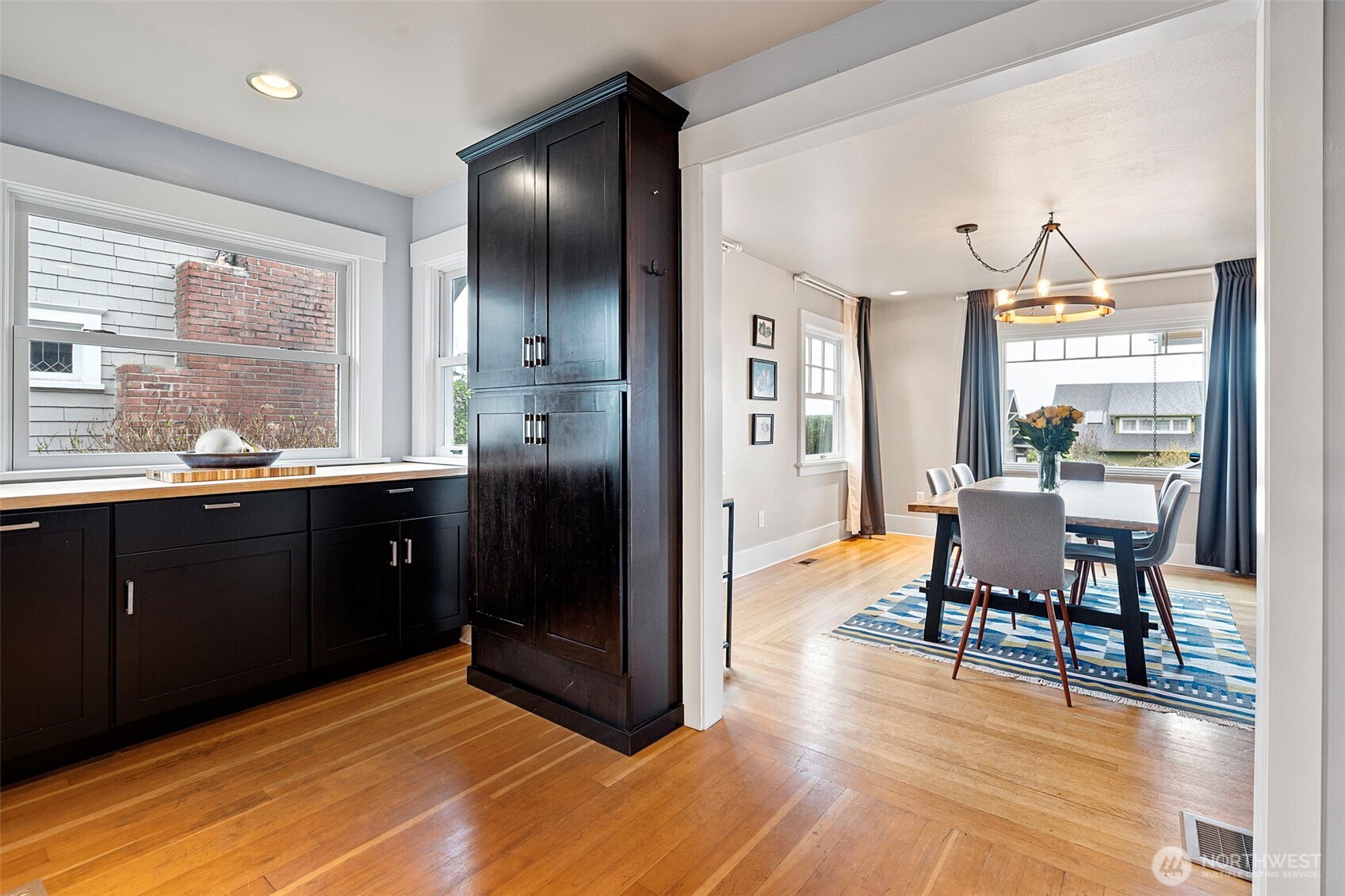 Custom butcher block countertop and additional storage.