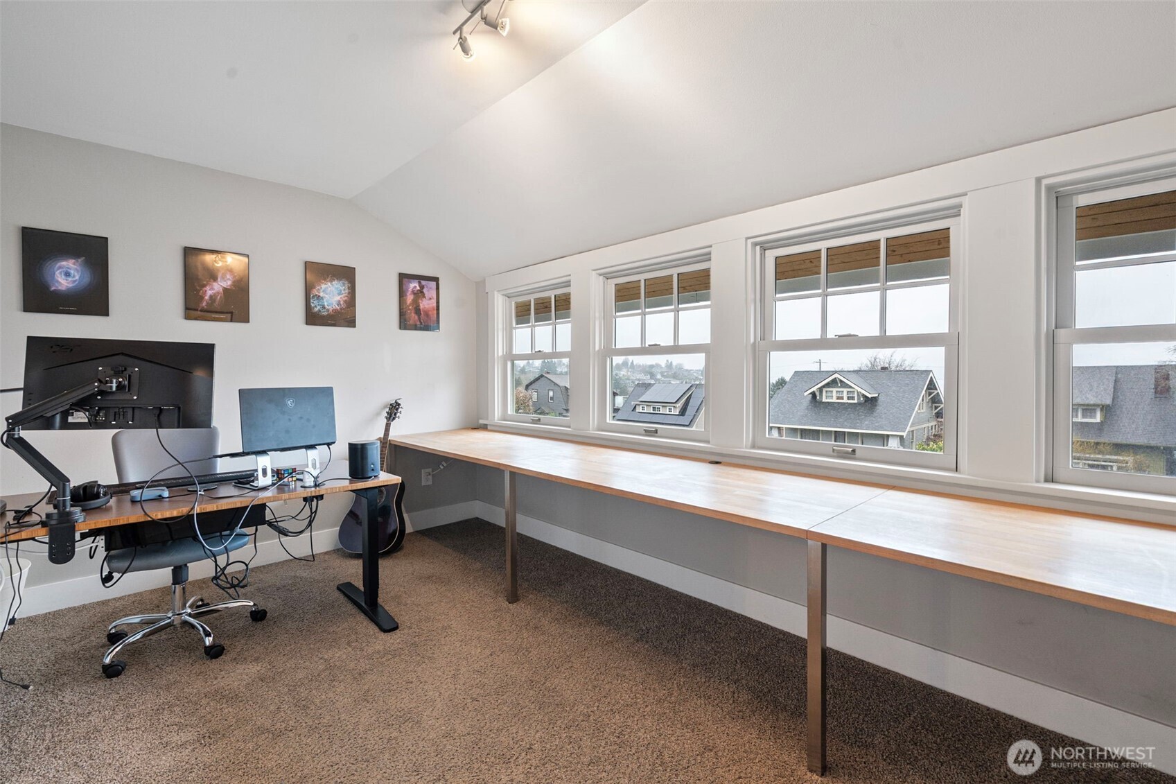Main floor hallways converge from bedrooms, to Living Room, stairway up, kitchen and stairway to back entrance/basement.