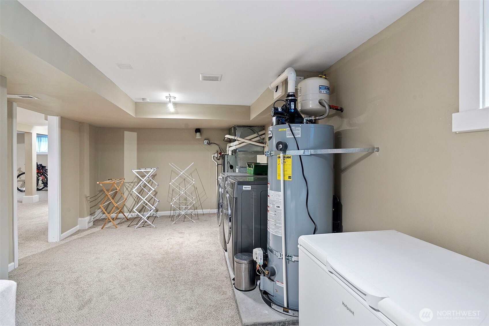 Next to large basement Bonus room is a giant sized laundry - to the right it an equally large storage area but you can't see it in this photo.