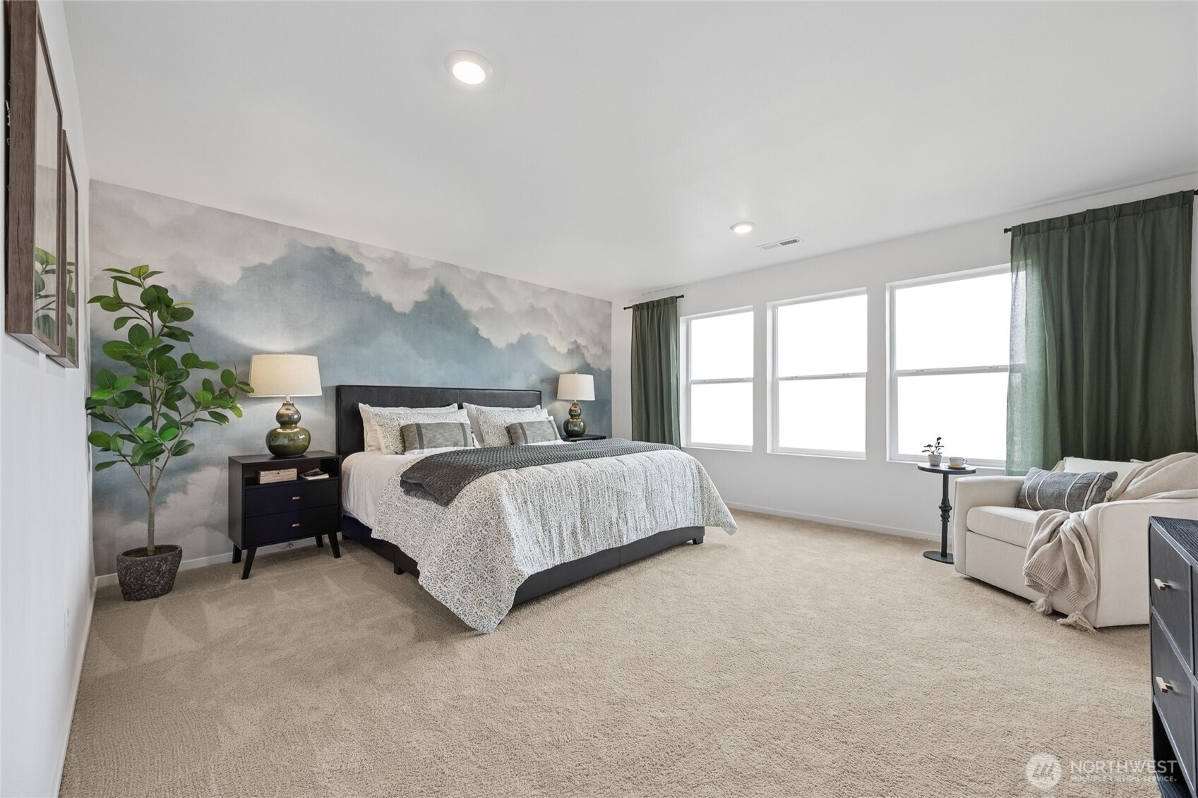 Relax and unwind in your spacious primary bedroom.  Pictures are for representational purposes only, colors and features may vary.