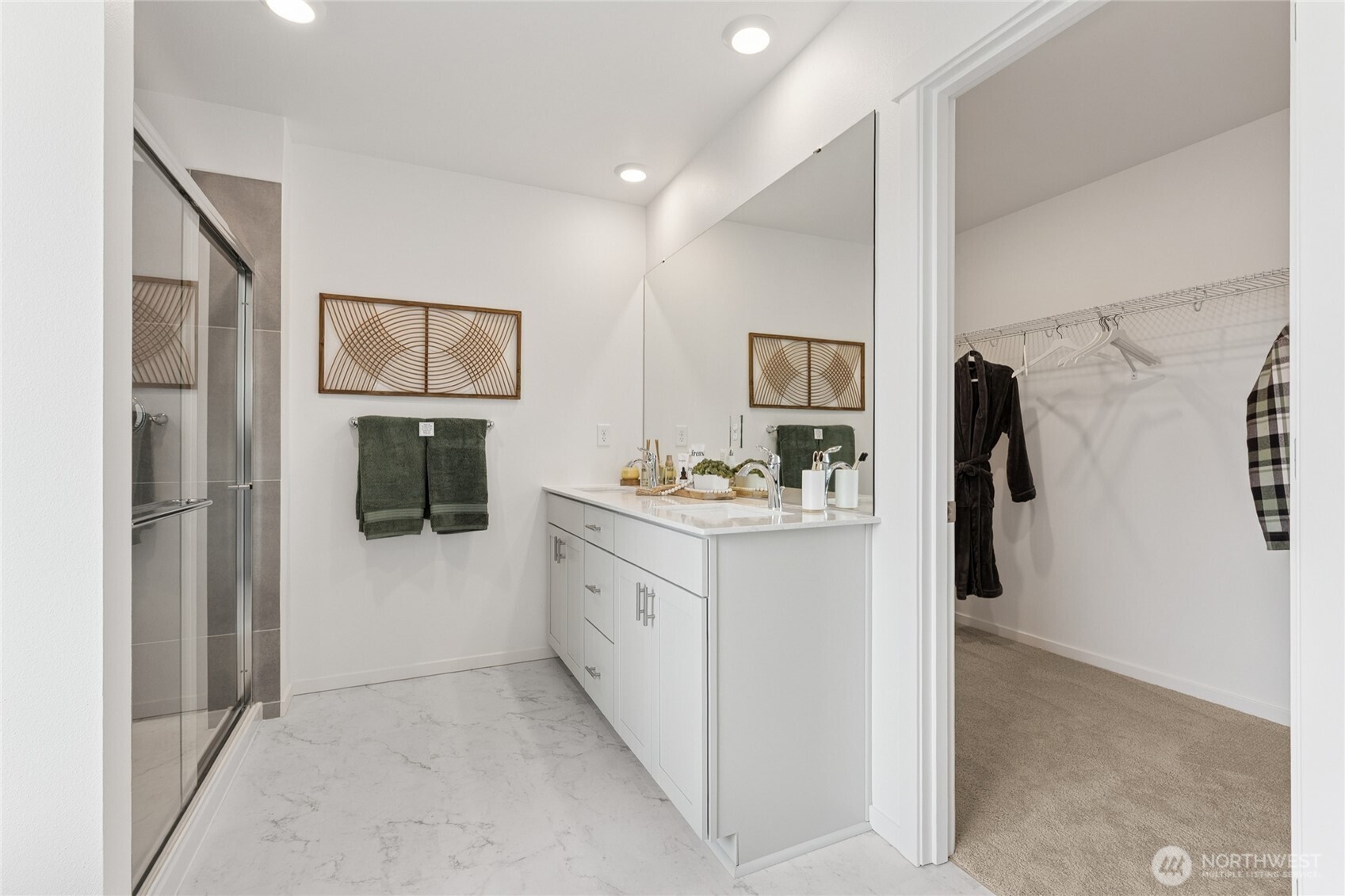 Double sinks with a lot of storage space.  Pictures are for representational purposes only, colors and features may vary.