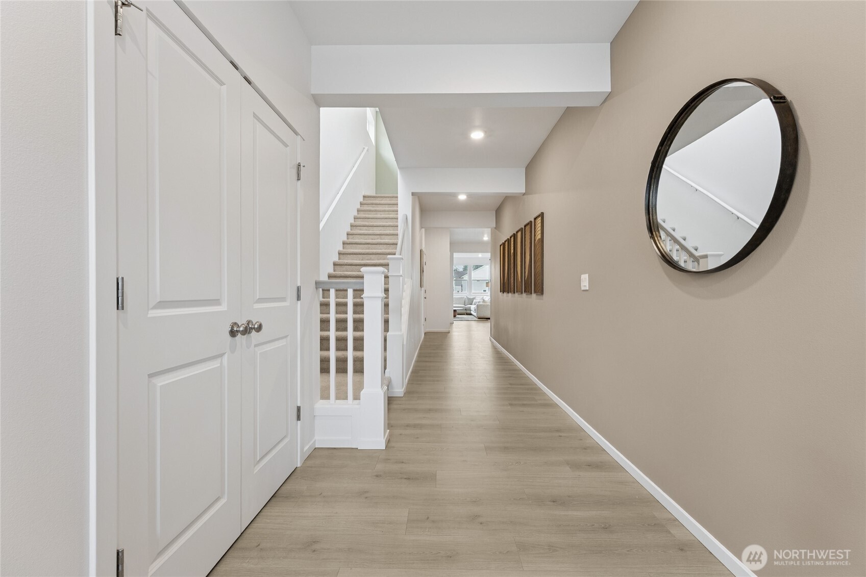 Grand entry with a wide hallway.  Pictures are for representational purposes only, colors and features may vary.