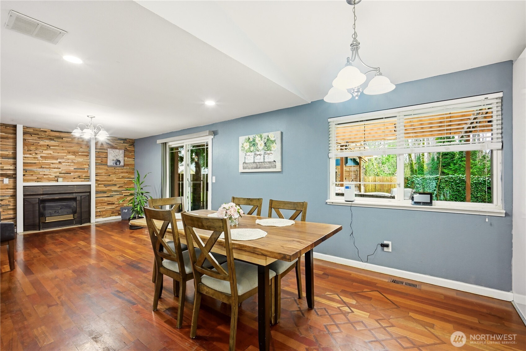 Dedicated dining area with elegant lighting, perfect for formal dinners or casual meals.