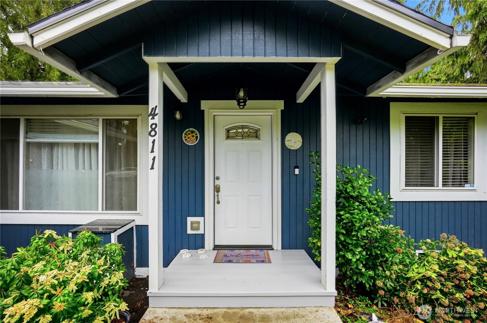 Charming covered front entry.
