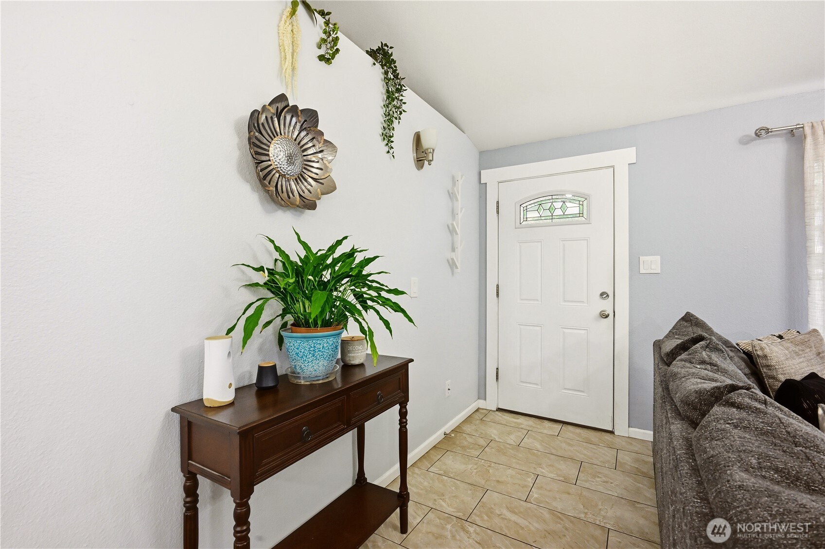 Airy entryway that opens into the spacious main living areas.