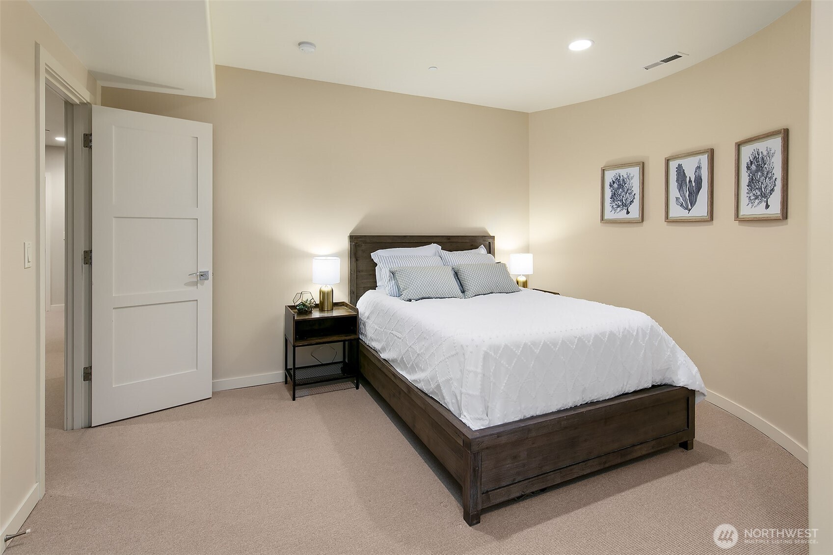 Guest bedroom at lower level with full bath