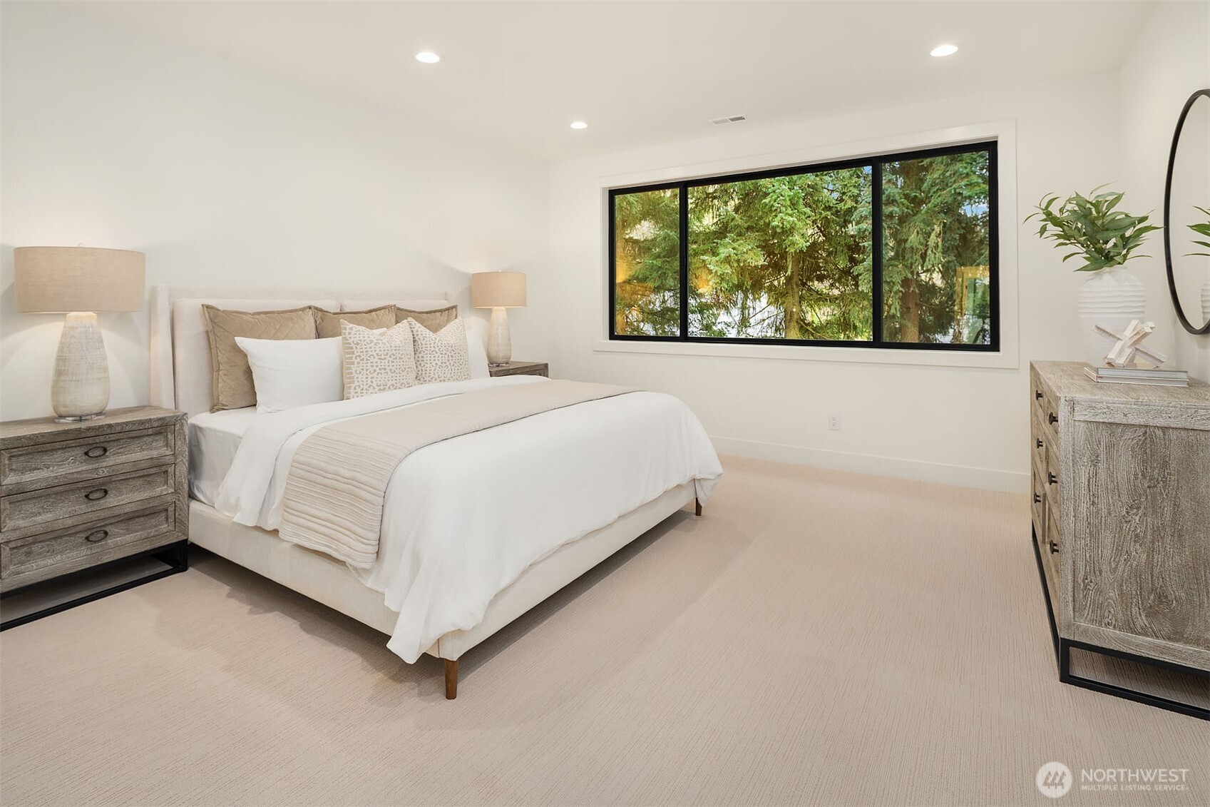 Designer primary suite with five-piece bath & heated floors