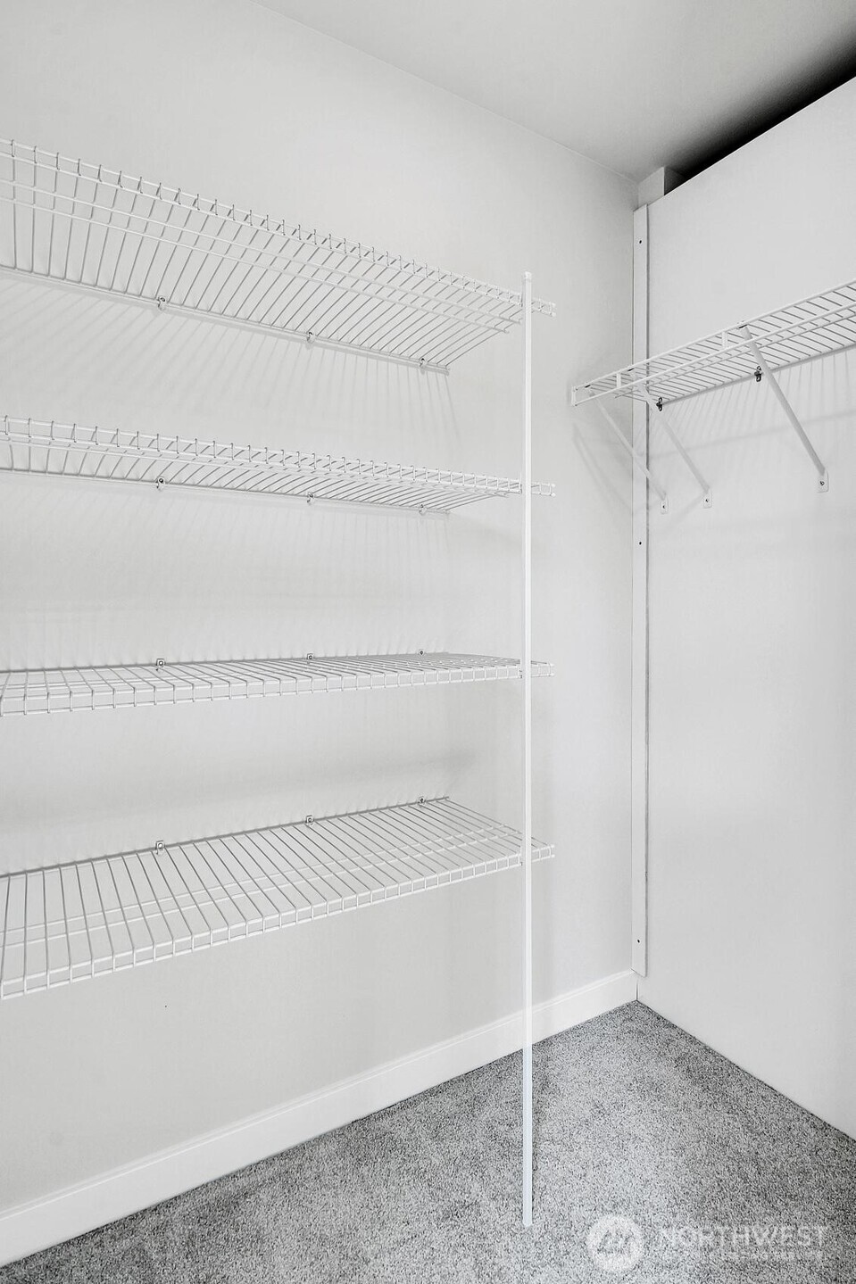 Primary walk-in closet.