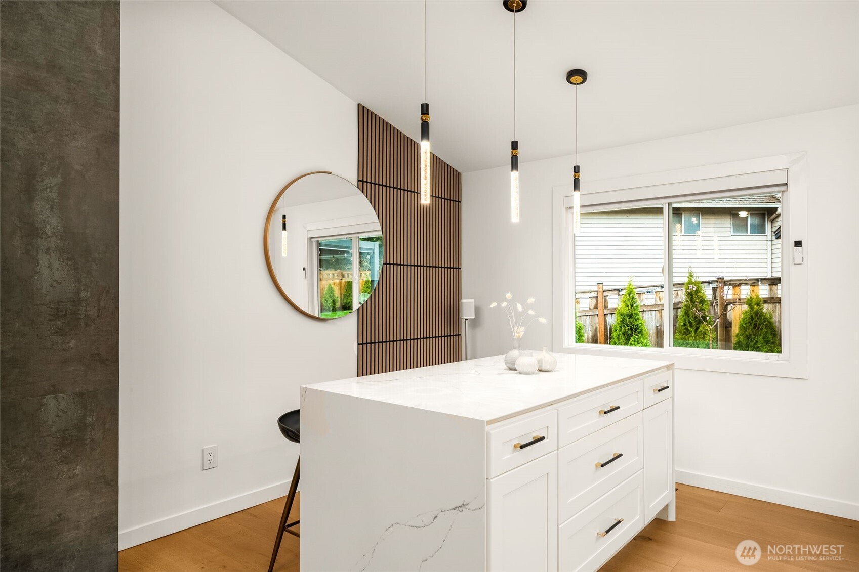 Oversized quartz island with double waterfall edges