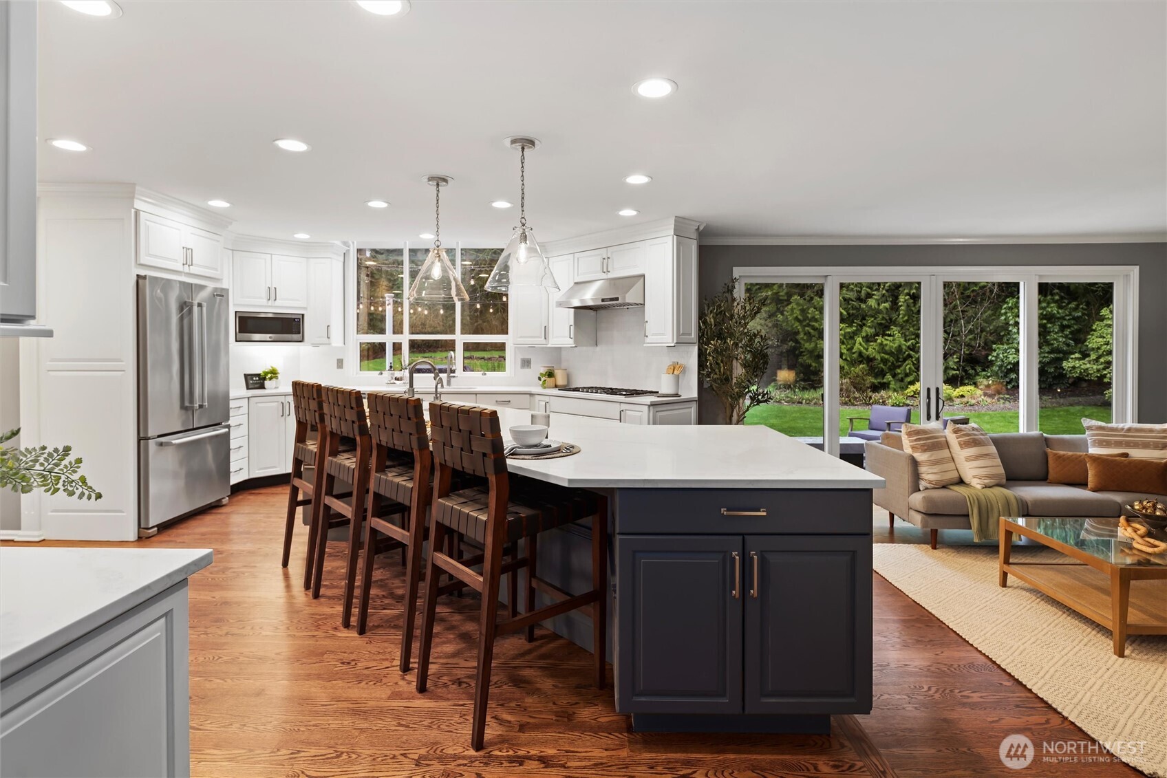 The residence features a stunning, fully updated chef’s kitchen (2025) designed for everyday living & entertaining