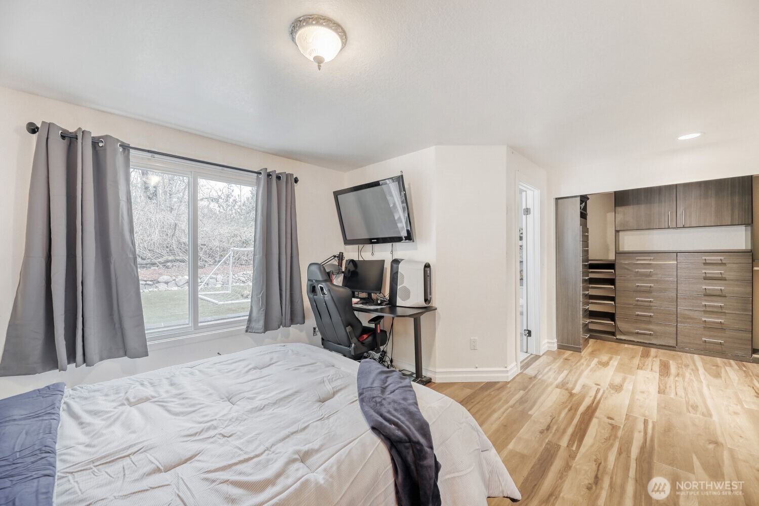 Main floor prime with extensive built-in closet plus gorgeous 3/4 bath