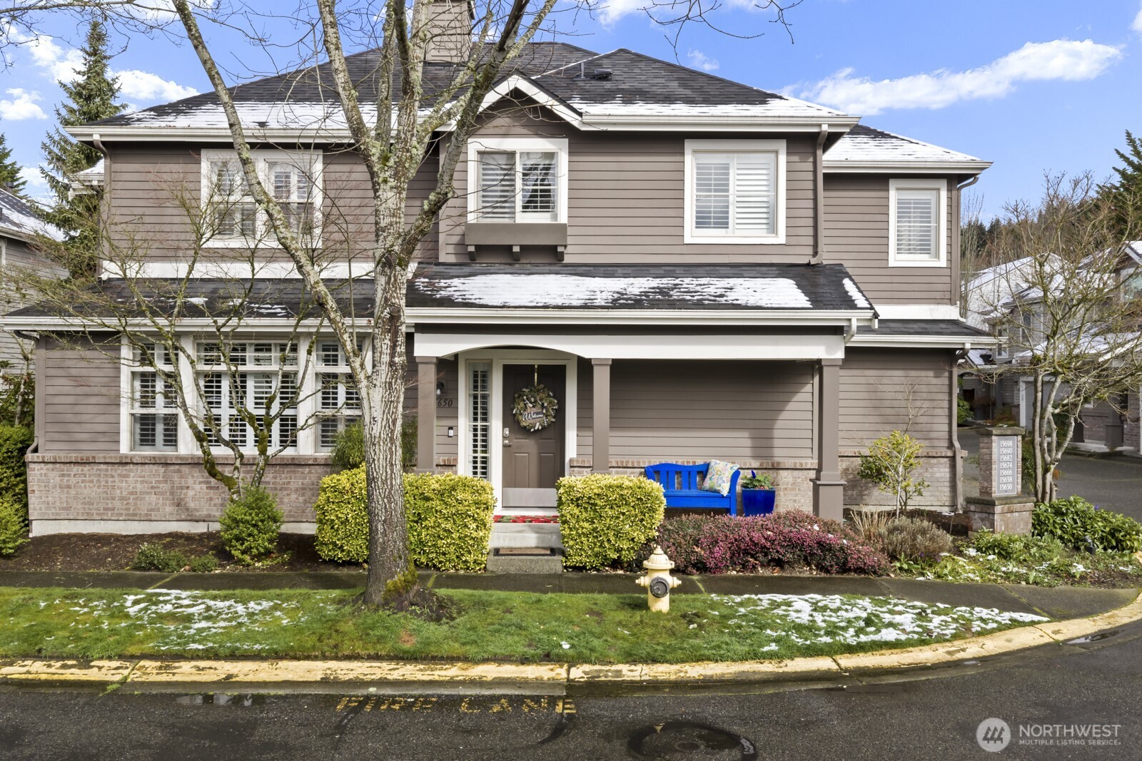 Charming craftsman exterior welcomes you to the covered front porch.