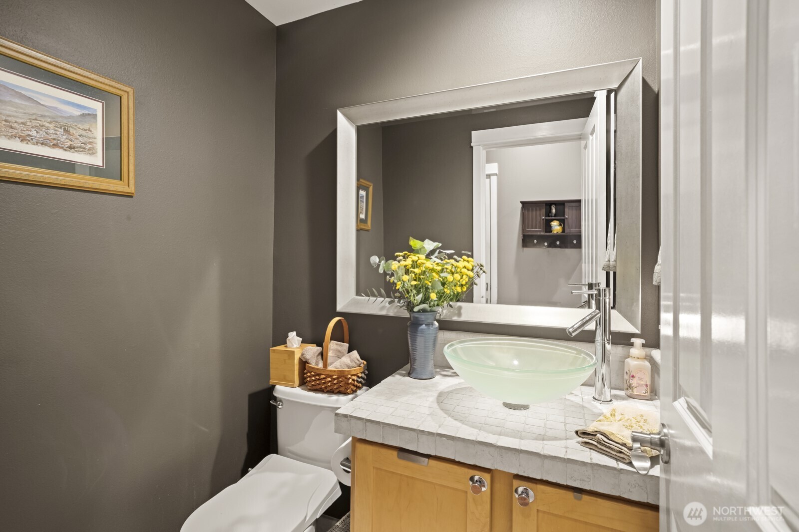 Powder room downstairs for guests to use.