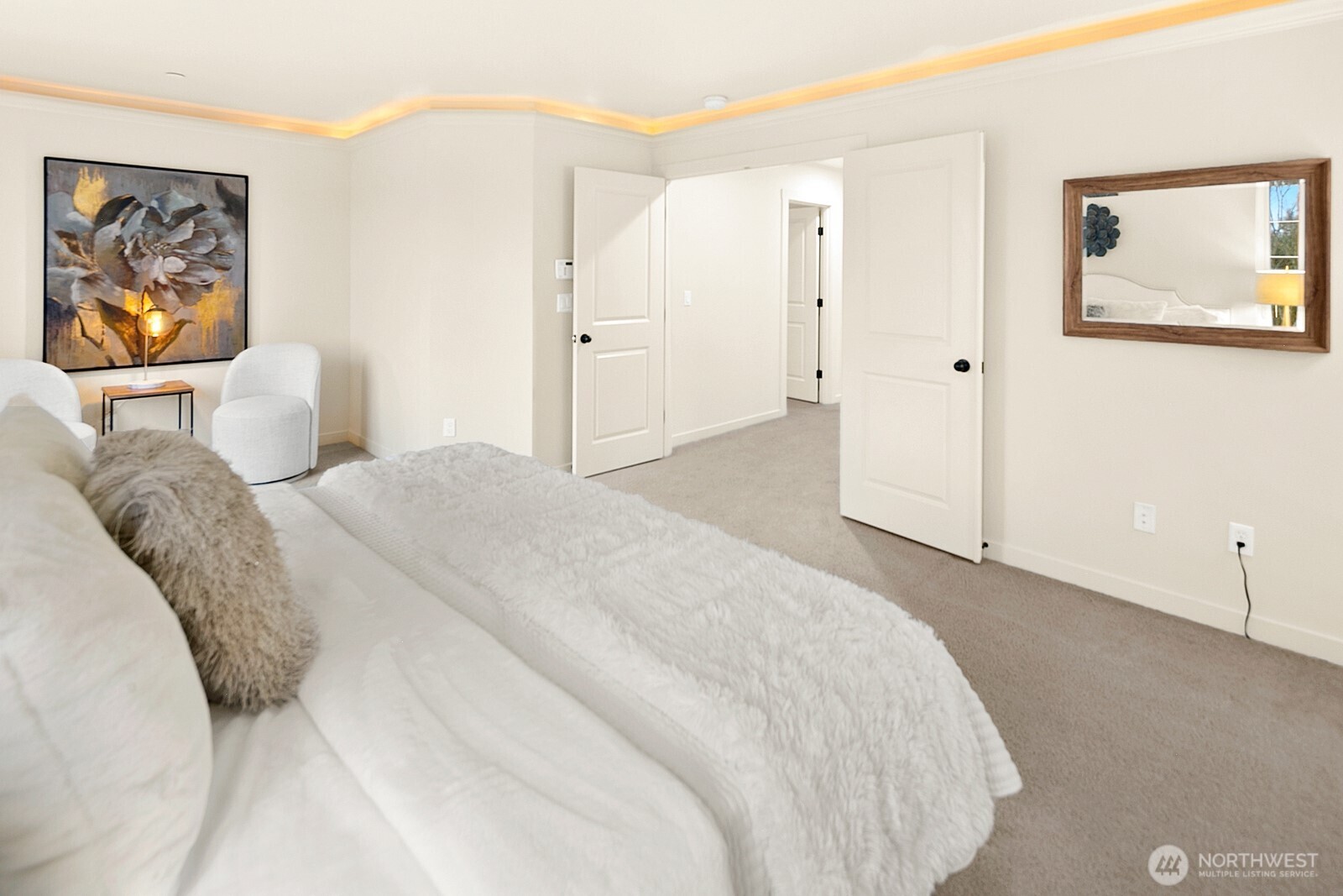 Primary Bedroom with Nook and Ceiling Lighting