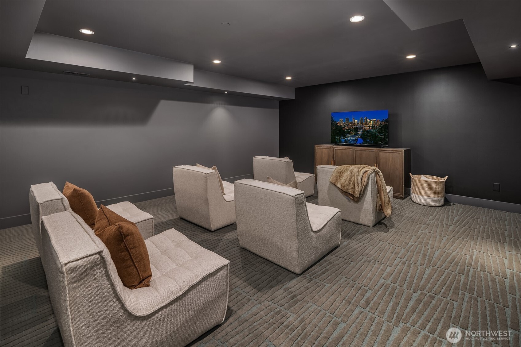 Downstairs, a home theater room.
