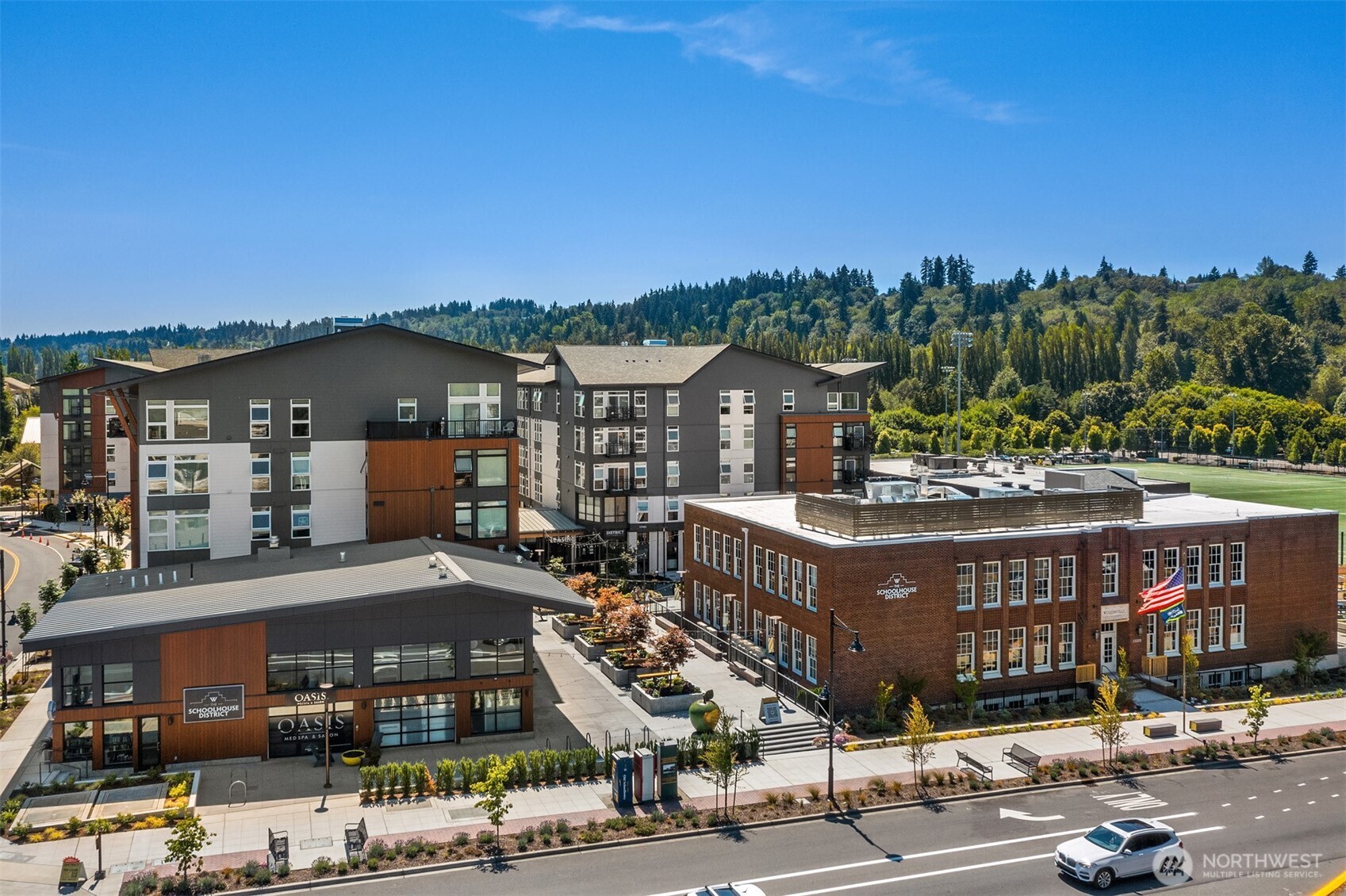 Woodinville Square located just across the street from the Schoolhouse District which features a curated collection of wine tasting rooms, dining options, seasonal events & many more treats in the heart of Downtown Woodinville.