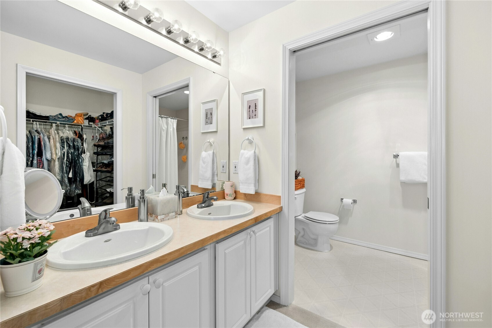 Private primary bath featuring dual vanities