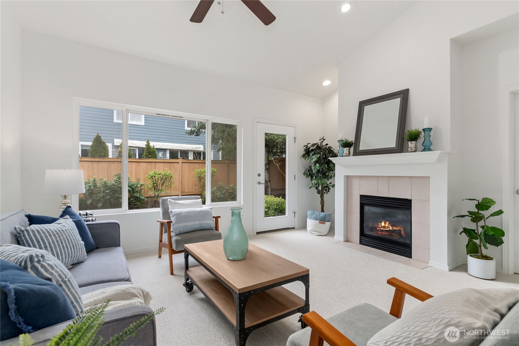 Living are with gas fireplace.