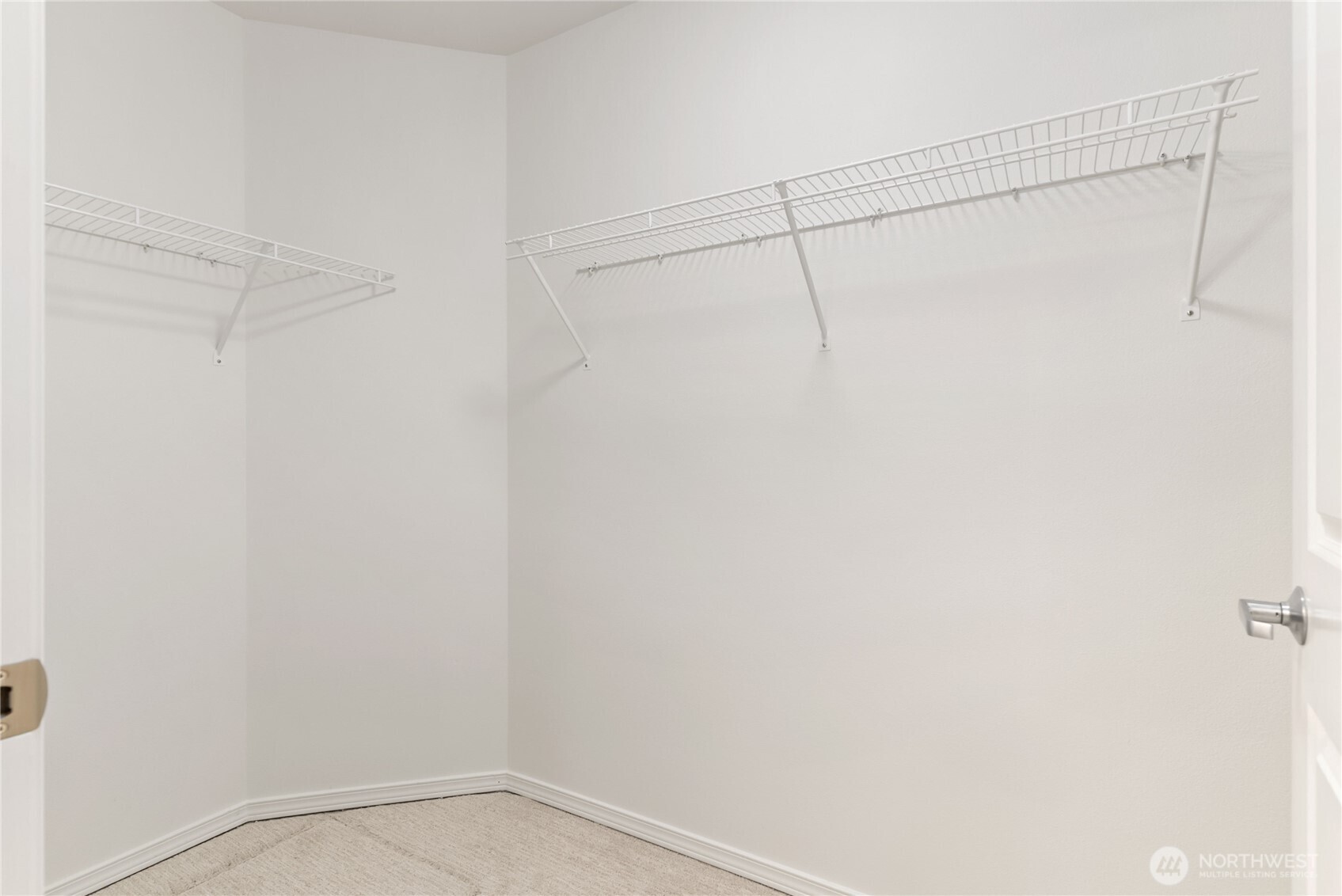 Primary walk in closet.