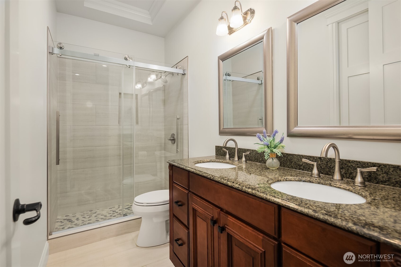 Refreshed Lower Bathroom with new tile walk in shower.