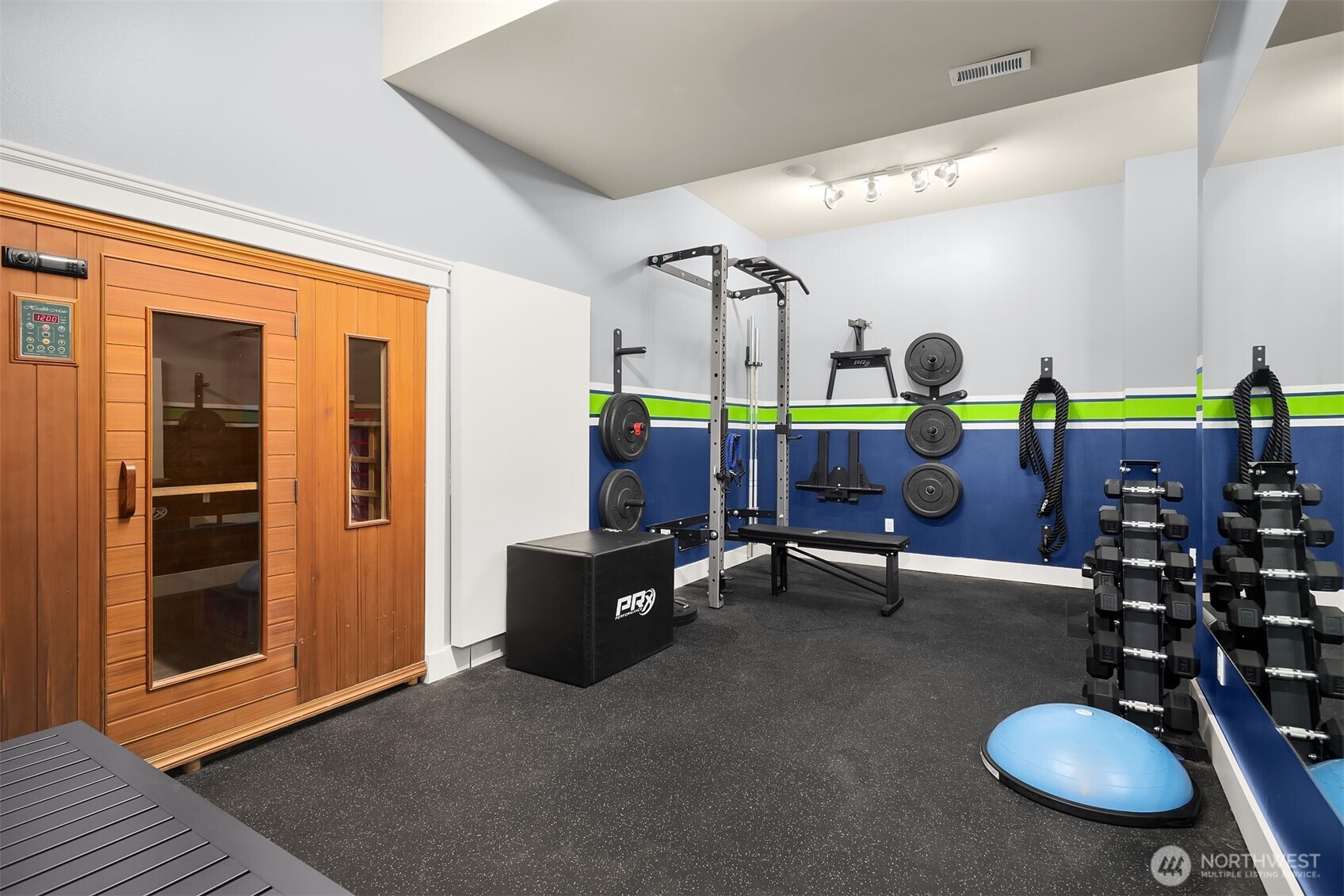 Get your work out on with a true home gym and sauna for recovery!