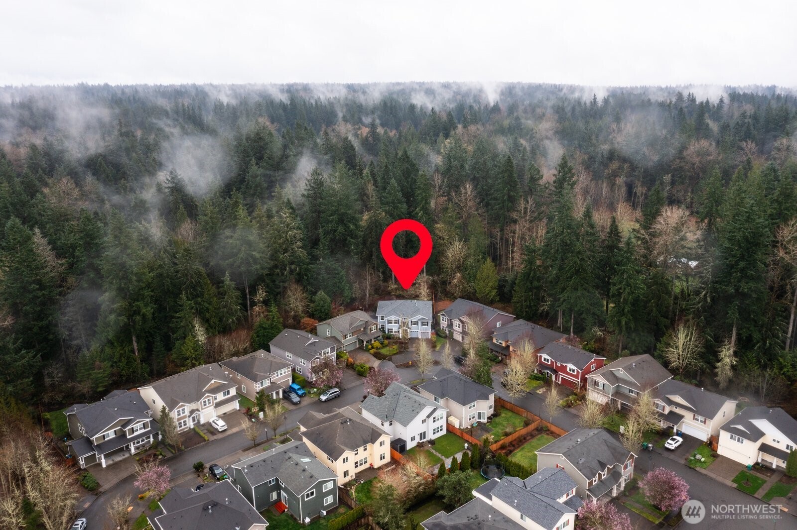 Perfectly positioned in a neighborhood setting, backing onto a lush greenbelt, on a pie shaped lot, maximizing back yard size