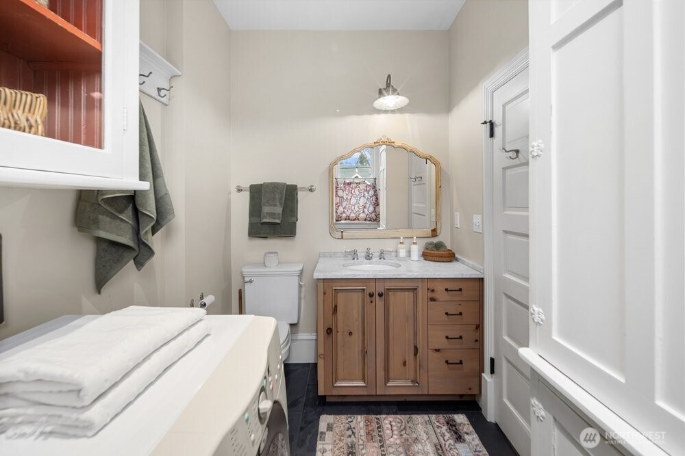 First floor laundry and half bath