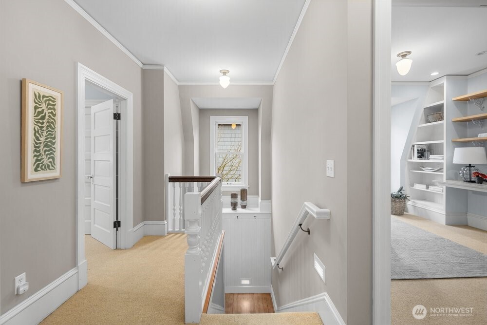 Upstairs hallway is open and bright