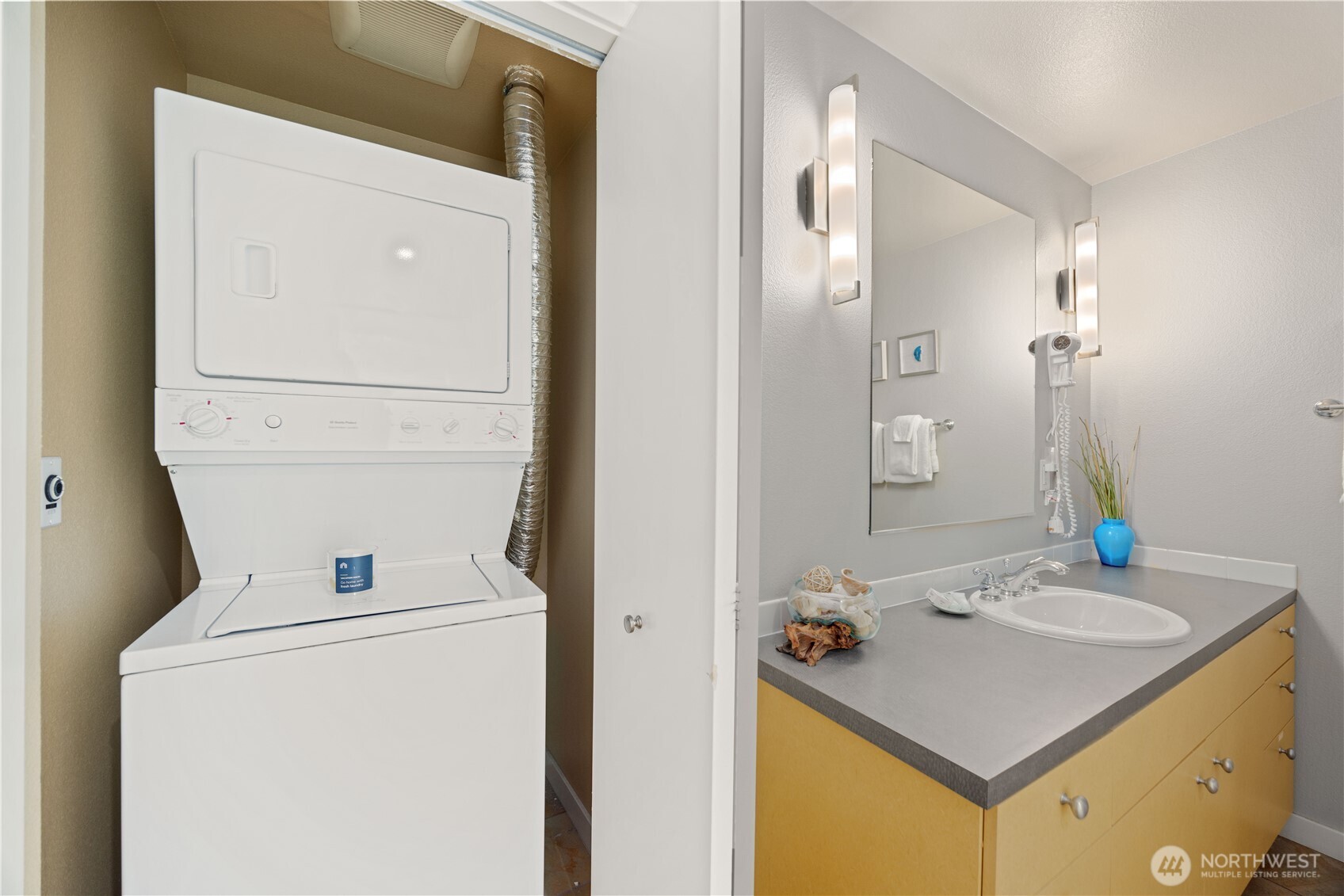 Guest bathroom with stackable washer/dryer