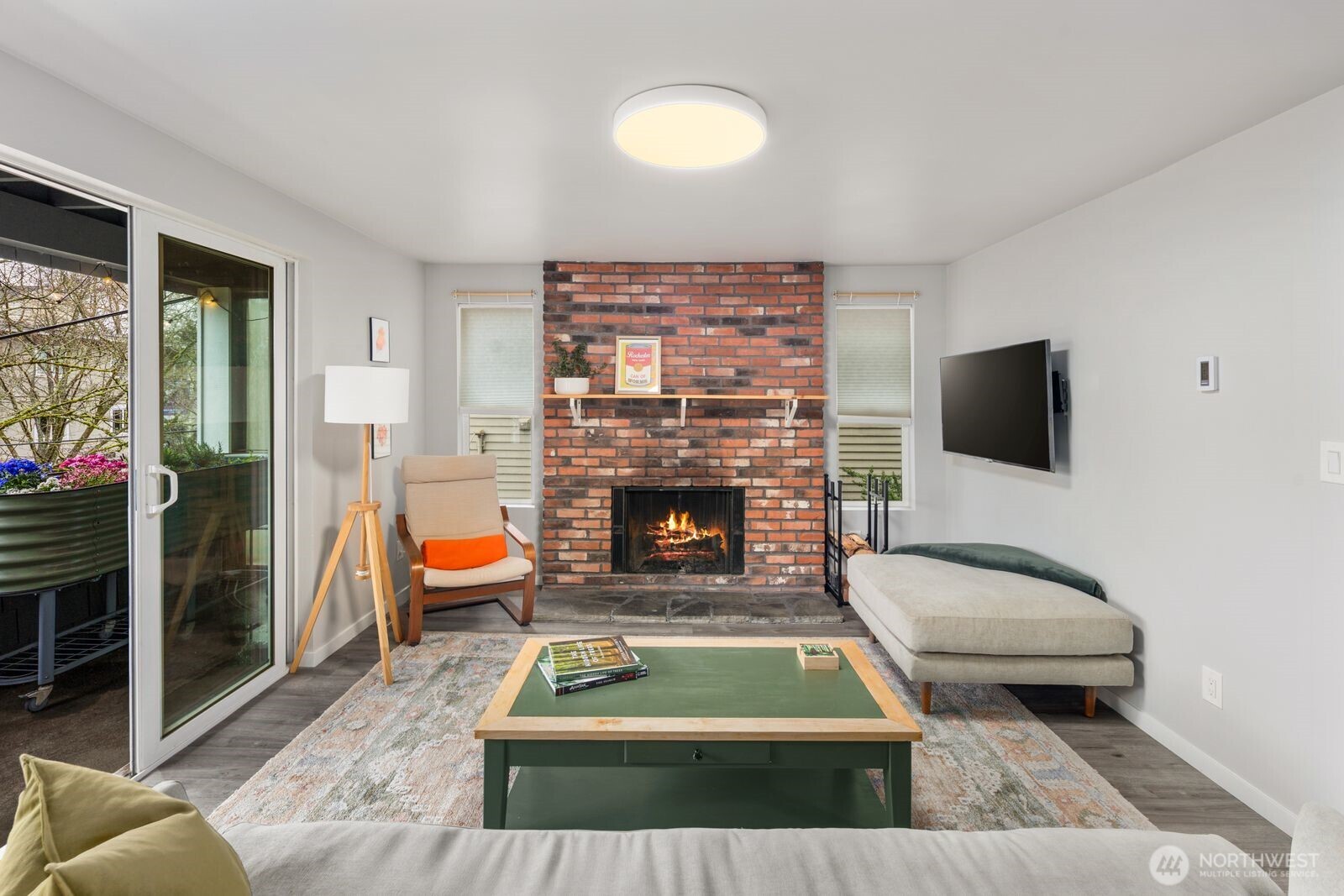 Living room features wood burning fireplace