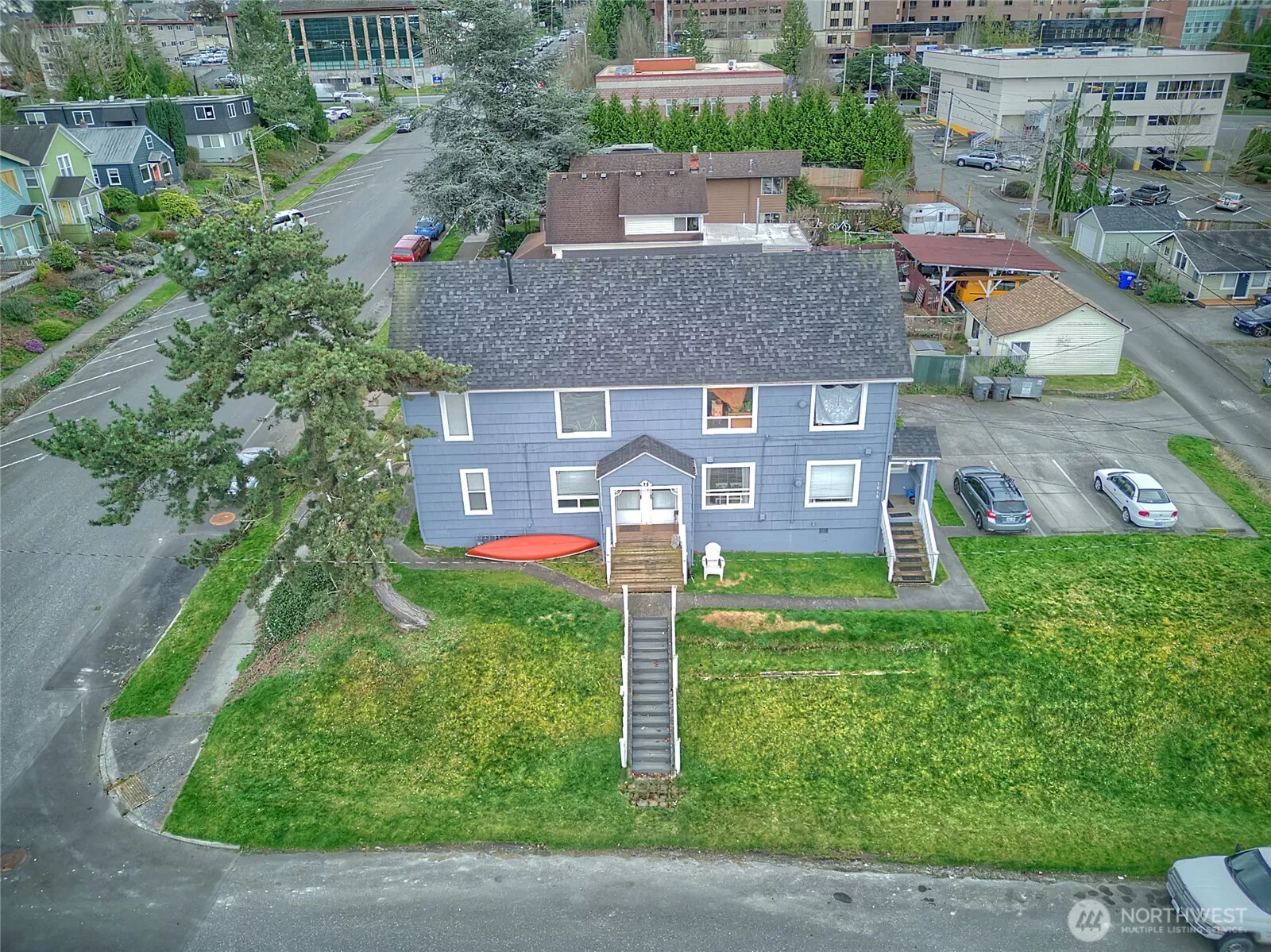 Everett 4-Plex with a 4 space paved parking lot