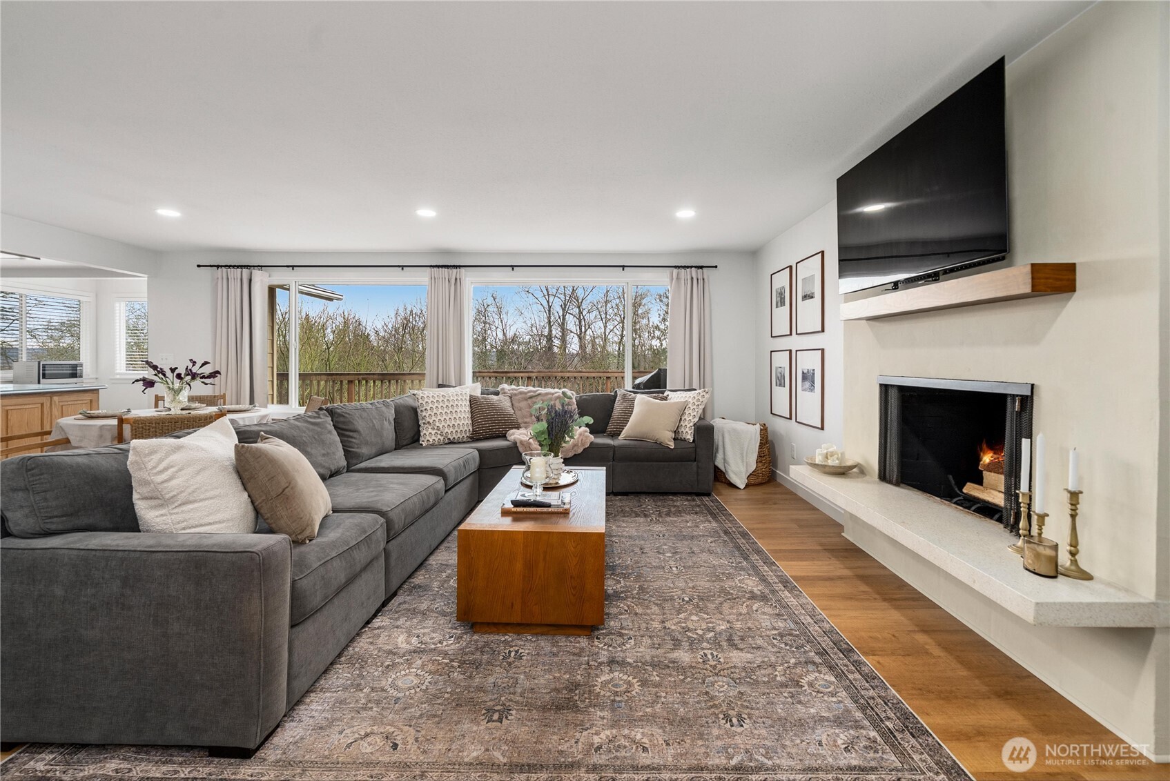 It sparkles with it's own glass doors to the deck and those wide plank LVP floors.