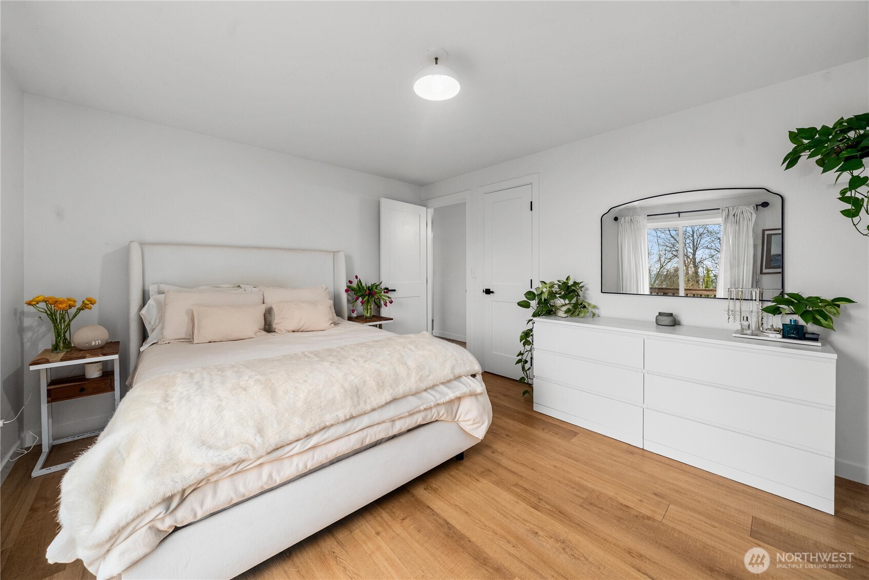Bedroom 2 showcases the new blinds that were installed throughout the main floor.